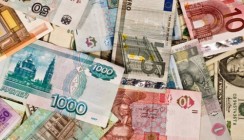 ВТБ первым на рынке запустил котирование биржевого фонда в трех валютах